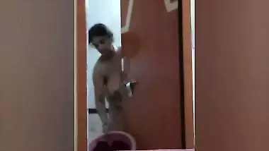 Mom naked in bathroom comes out to take bucket