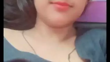 Bhabhi in glasses goes naked and fingers cunt