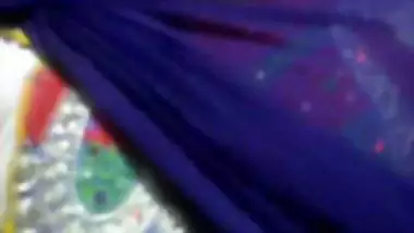 Teenage desi girl fondling her boobs through kameez