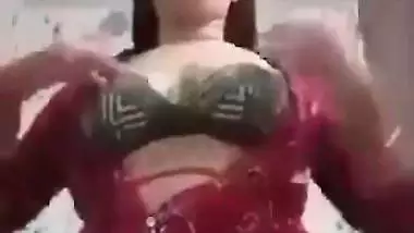 Sexy girl shows her boobs and ass to striptease her BF