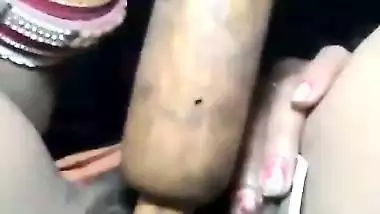 Desi using chapati rod dildo to masturbate